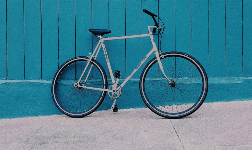 home-hero-bike-blue-wall-1024x612-edited